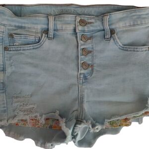 American Eagle Distressed Hi-Rise Shortie Daisy Print Pockets Fall Below…